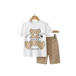 ست تیشرت شلوارک بچگانه مدل GUCCI سفید طلایی سایز 40,45 - تصویر 3