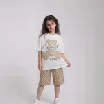 ست تیشرت شلوارک بچگانه مدل GUCCI سفید طلایی سایز 40,45